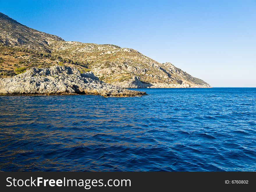 Rocky Mediterranean Beach. Samos Island, Greece.