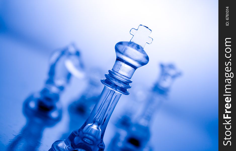 Transparent chess on a blue background. Transparent chess on a blue background