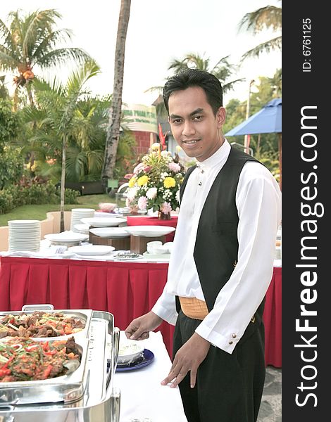 Waiter at buffet