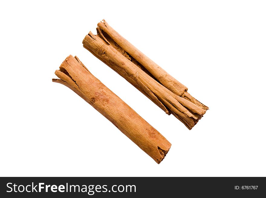 Two cinnamon sticks on plain white background. Two cinnamon sticks on plain white background