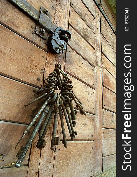 On garage collars the sheaf of the ancient keys opening padlocks hangs. On garage collars the sheaf of the ancient keys opening padlocks hangs
