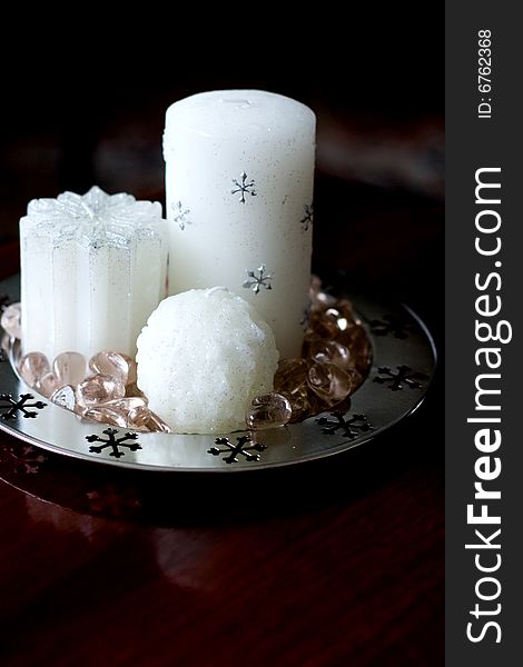 Pure white beautiful christmas candle on table. Pure white beautiful christmas candle on table