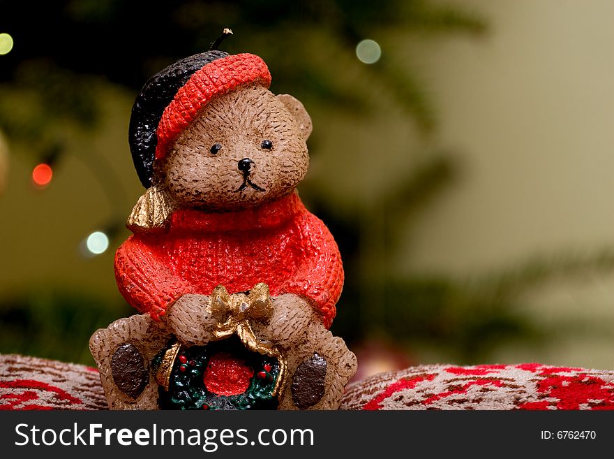 Christmas bear candle near xmas tree