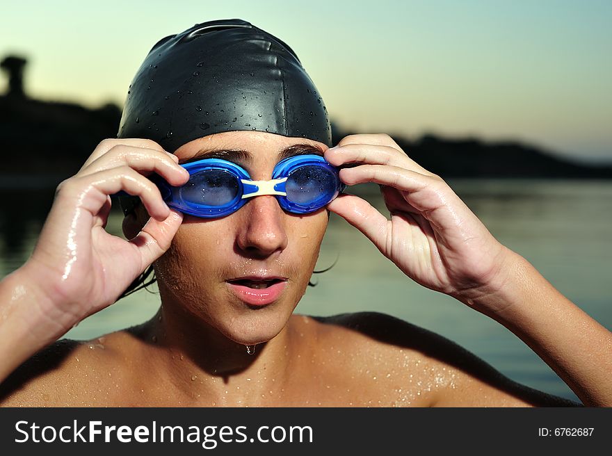 Close up portrait of a young boy swimmer. Close up portrait of a young boy swimmer