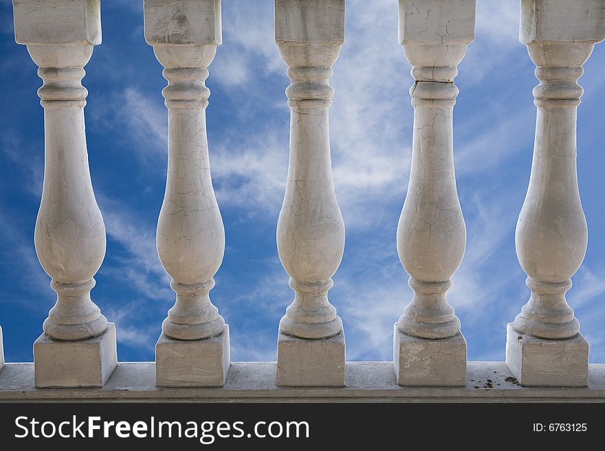 White stone balustrade in blue sky. White stone balustrade in blue sky