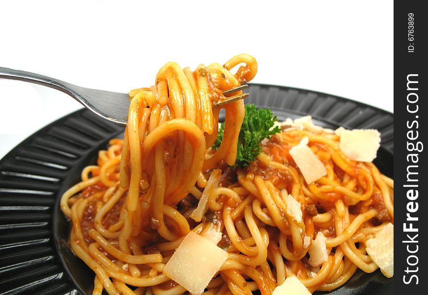 A fork with homemade spaghetti. A fork with homemade spaghetti