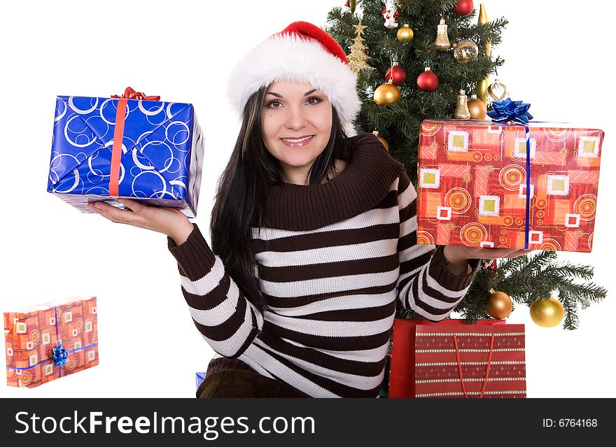 Happy brunette woman over christmas tree. Happy brunette woman over christmas tree
