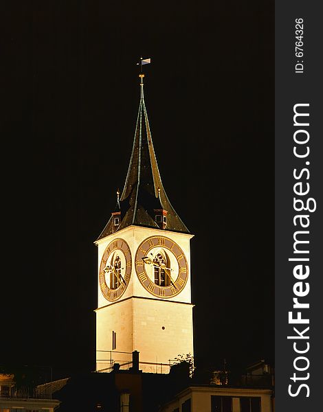 St. Peter's Church tower with Europe?s largest church clock face in Zurich at night. St. Peter's Church tower with Europe?s largest church clock face in Zurich at night