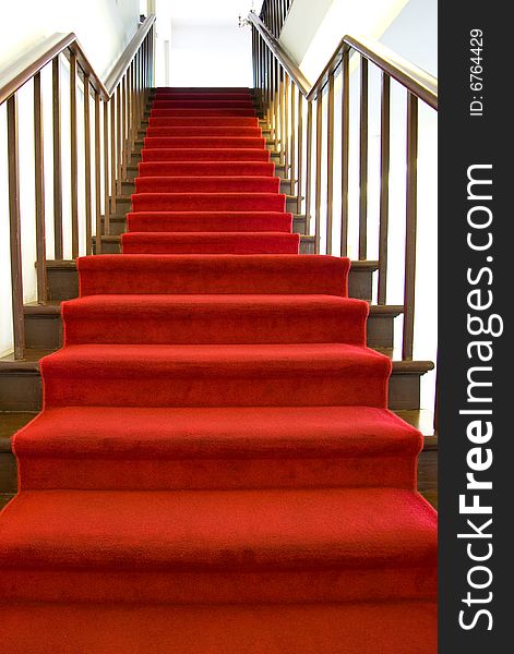 Flight of steps overlaid with red carpet. Flight of steps overlaid with red carpet