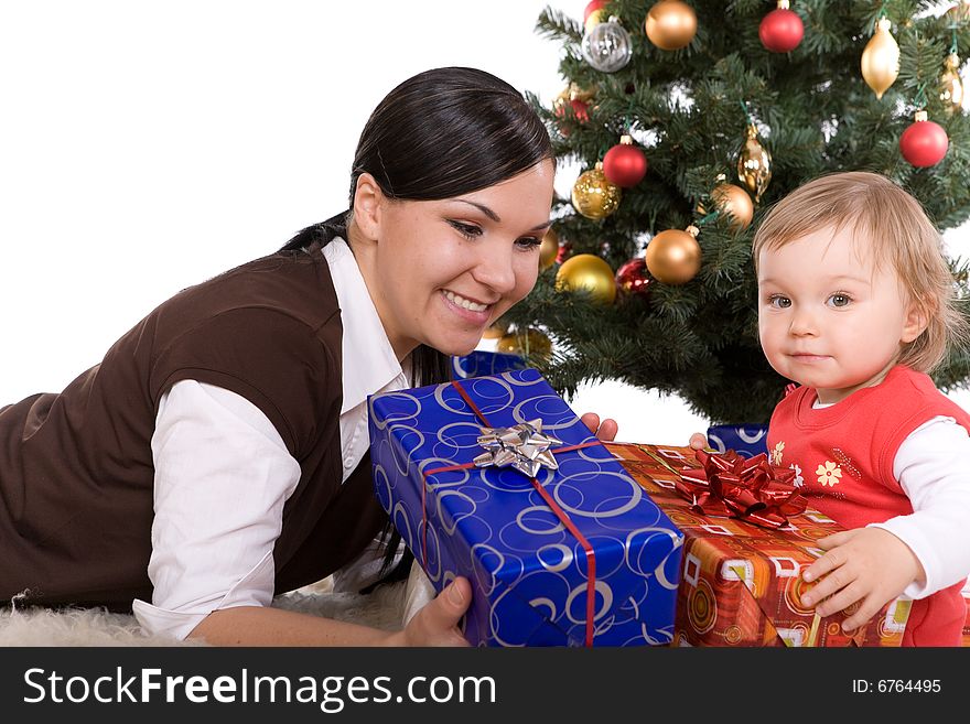 Happy mother and daughter over christmas tree. Happy mother and daughter over christmas tree