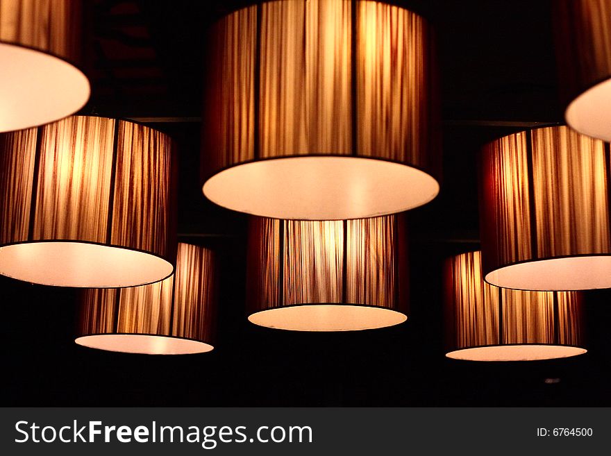 Some lamps in dim room