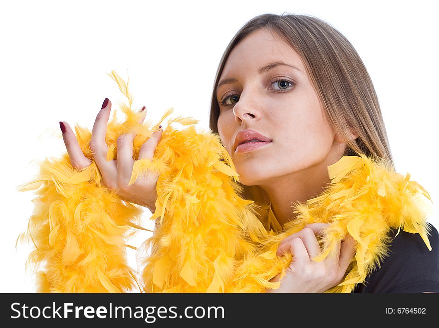 Portrait of the beautiful girl with yello feathers