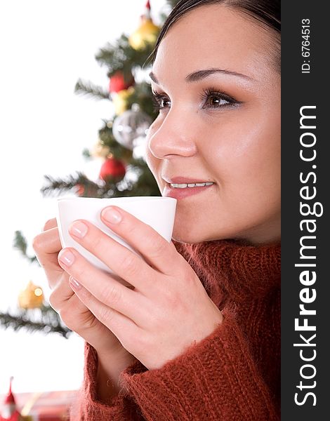 Happy brunette woman over christmas tree. Happy brunette woman over christmas tree