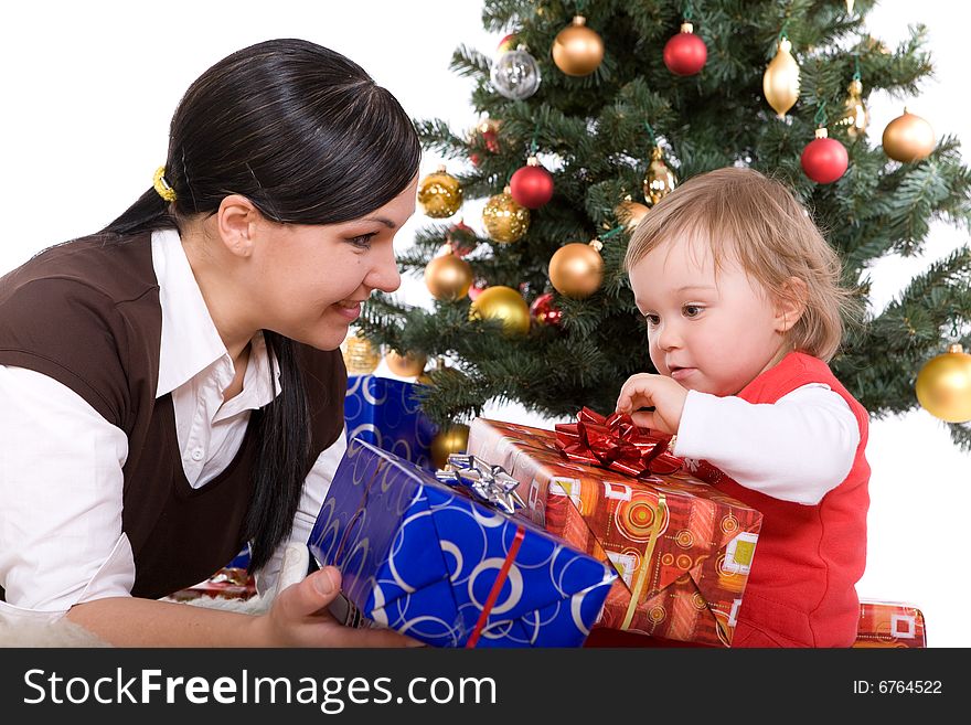 Happy mother and daughter over christmas tree. Happy mother and daughter over christmas tree