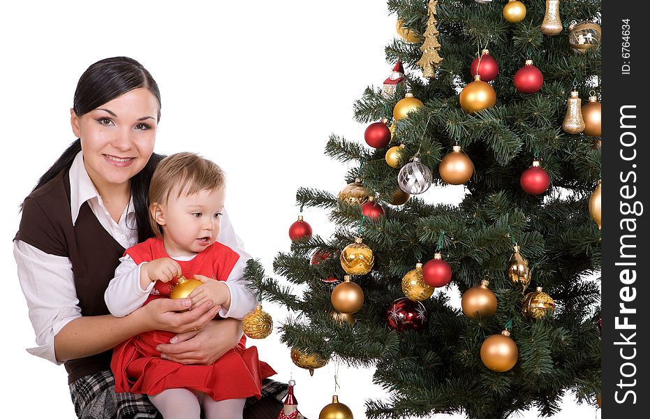 Happy mother and daughter over christmas tree. Happy mother and daughter over christmas tree