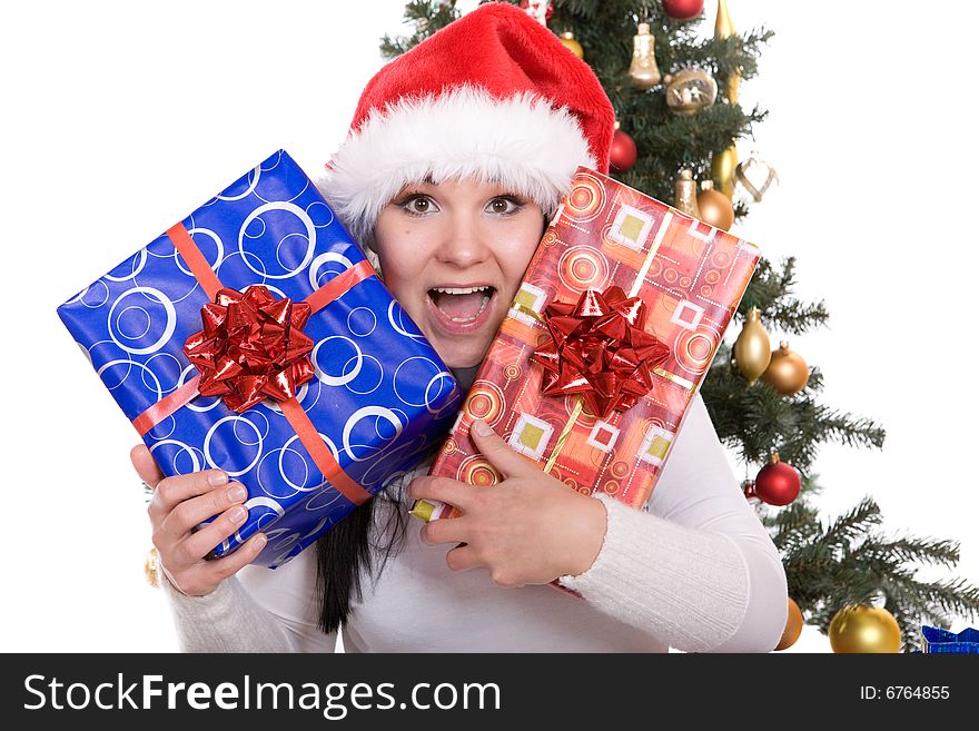 Happy brunette woman over christmas tree. Happy brunette woman over christmas tree