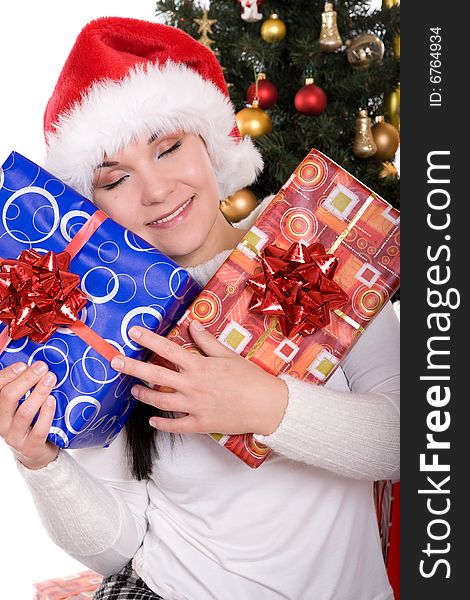 Happy brunette woman over christmas tree. Happy brunette woman over christmas tree