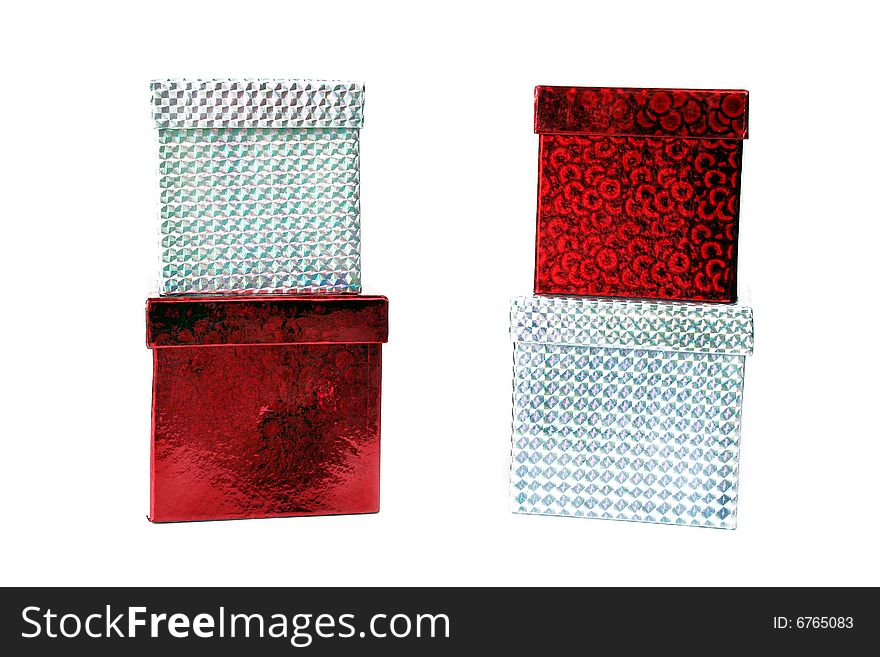 Four christmas gifts isolated on a white background.