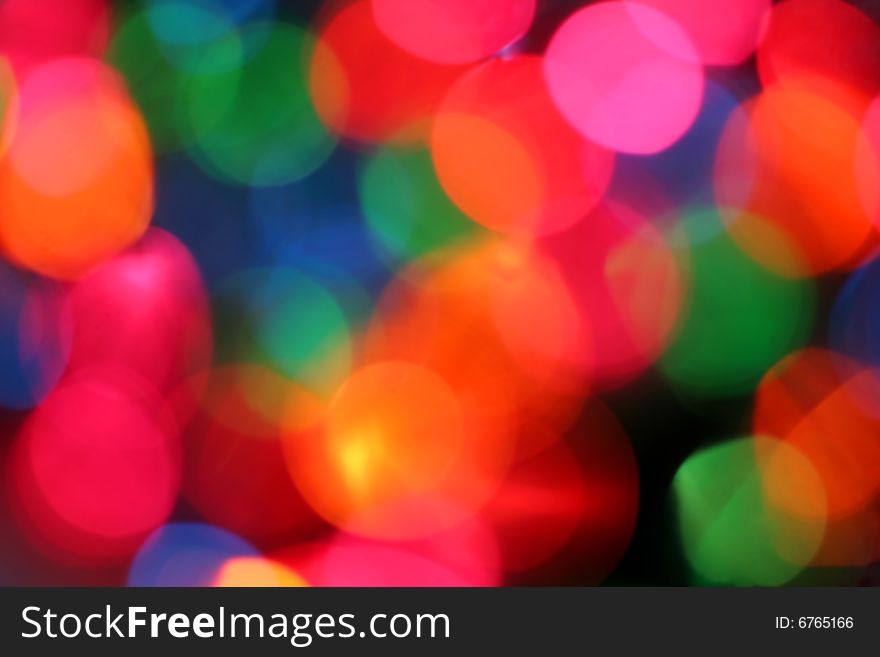 Blurred background of colored Christmas lights. Blurred background of colored Christmas lights.