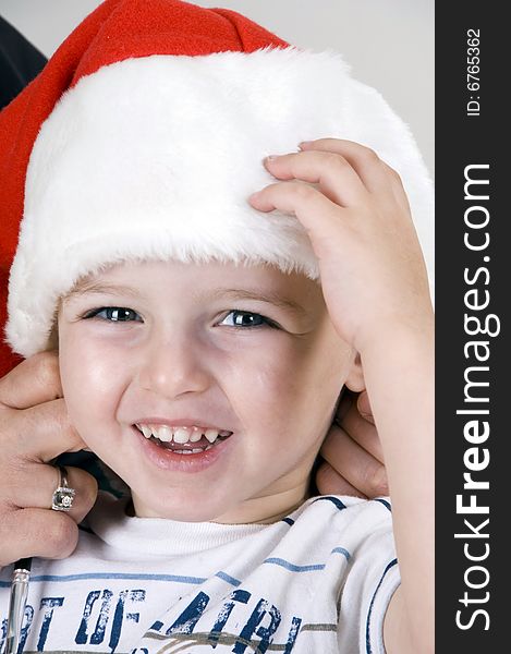Portrait of cute little boy with christmas hat