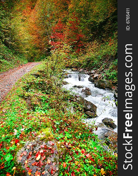 An image of river in autumn mountains. An image of river in autumn mountains