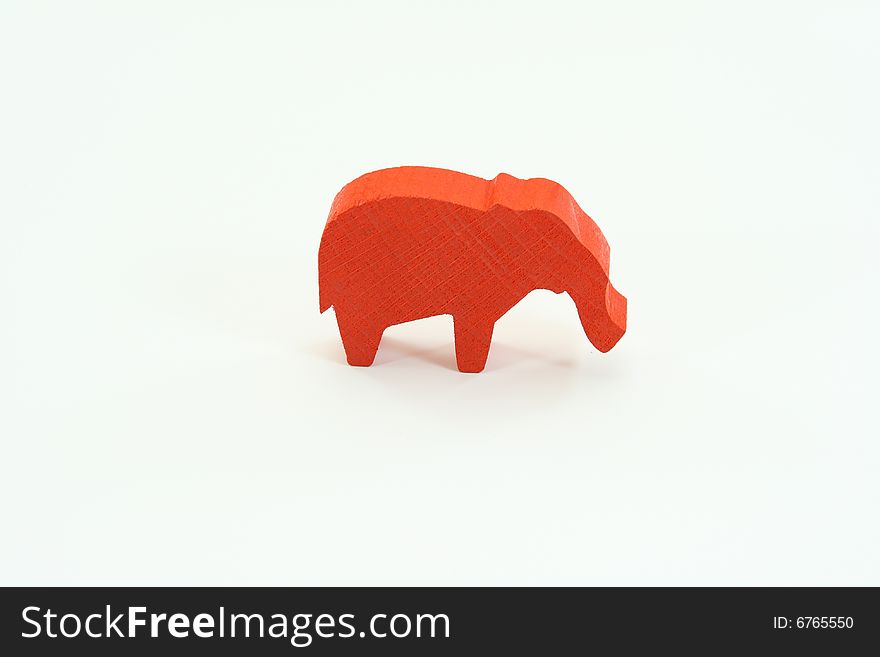 Red wooden elephant on a white background