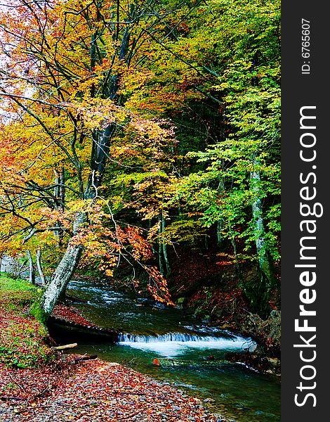 An image of river in autumn mountains. An image of river in autumn mountains