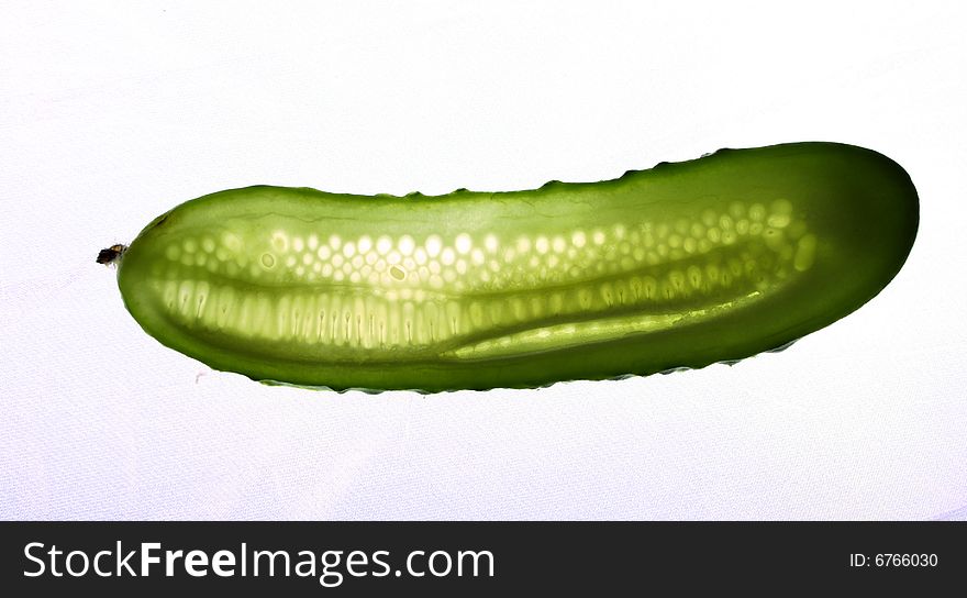 Green fresh cucumber isolated over white background