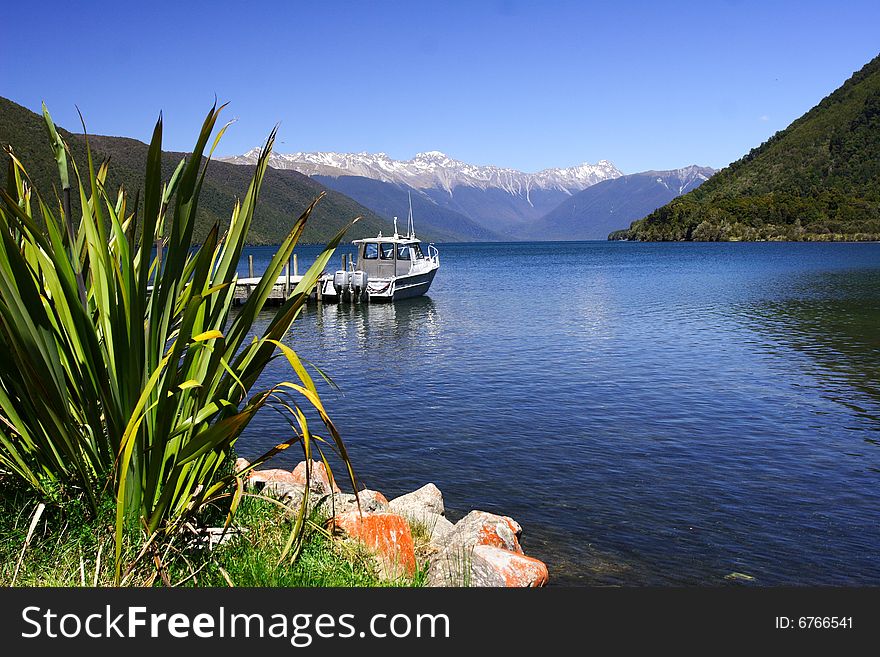 Pure lake rotoiti in nelson lake national park, new zealand