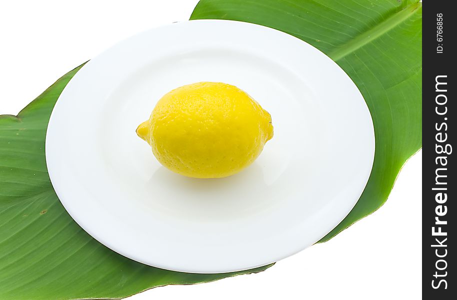 Lemon on a white plate