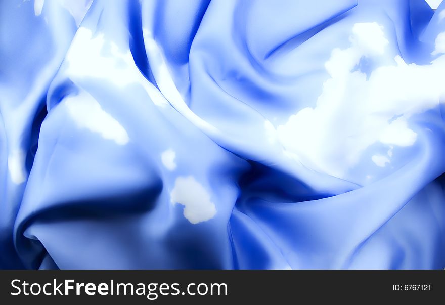 Texture of dark blue silk close up