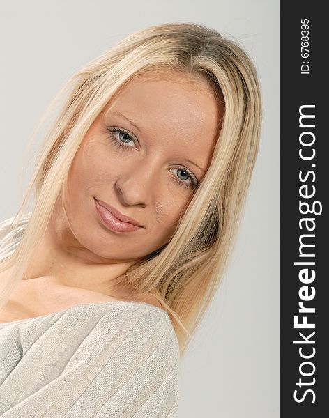 Close up portrait of cute young lady with straight blond hair. Close up portrait of cute young lady with straight blond hair