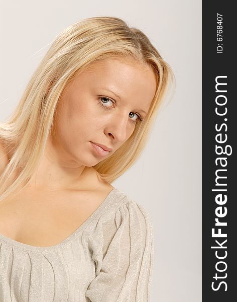 Close up portrait of cute young lady with straight blond hair. Close up portrait of cute young lady with straight blond hair