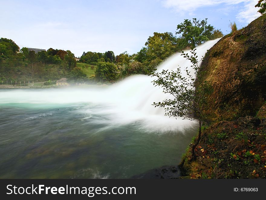 The Europe largest falls Rhine Falls in Switzerland with motion blur. The Europe largest falls Rhine Falls in Switzerland with motion blur