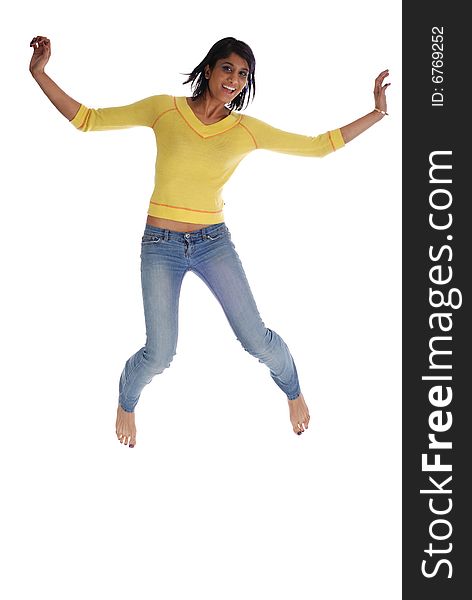 Picture of a girl in yellow jumping on a white background