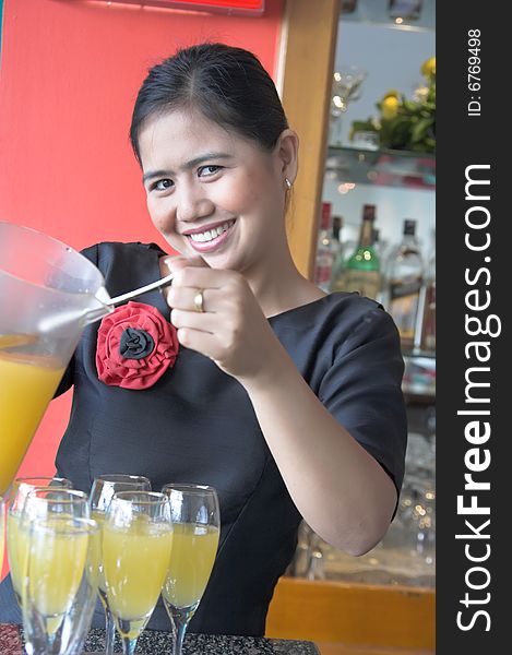 Waitress Making Drink