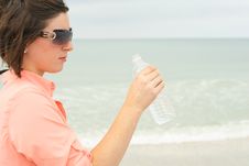 Brunette With Bottled Water Royalty Free Stock Image Brunette With Bottled Water Royalty Free Stock Image