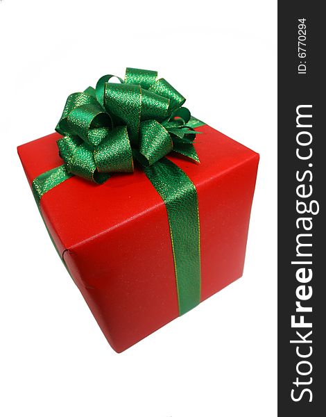Gift wrapped in red with a green ribbon