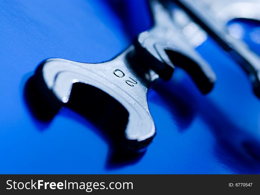 Spanners isolated on a blue background. Spanners isolated on a blue background