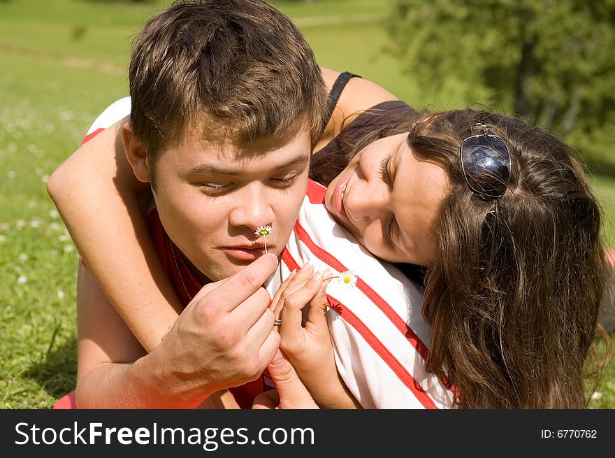 Happy couple playing in the park