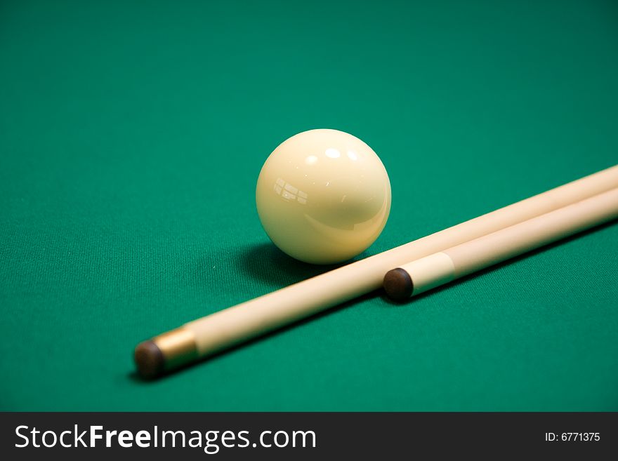 Billiard set on green table . Focus point on a ball