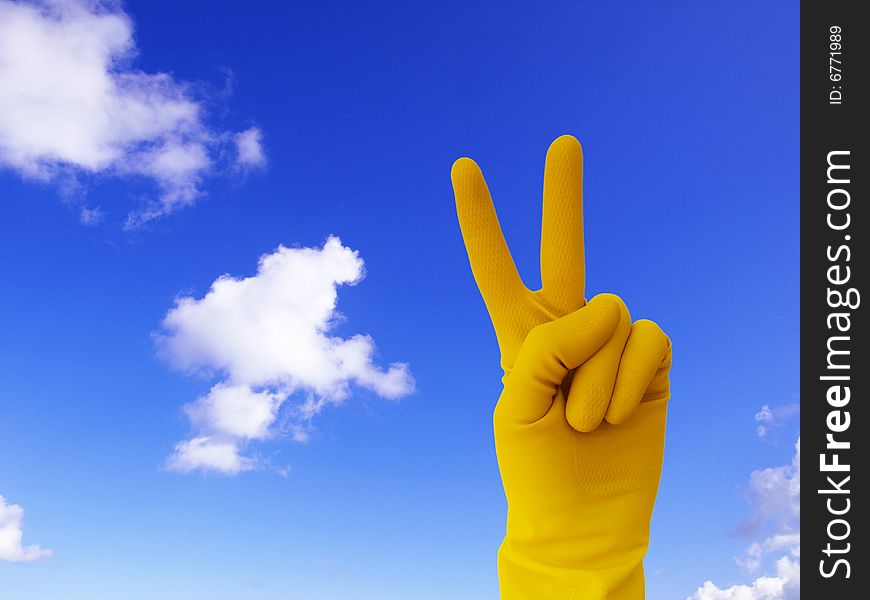 Victory sign on sky background