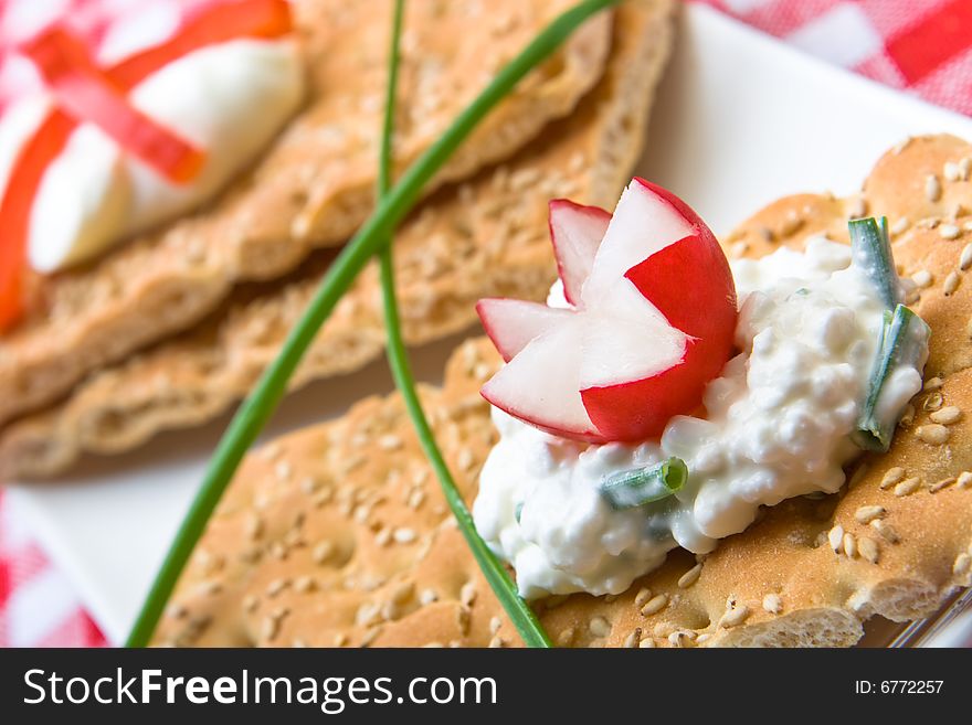 Delicious crispbreads with cottage cheese and chives. Delicious crispbreads with cottage cheese and chives