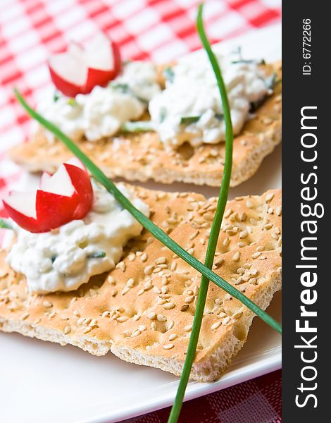 Delicious crispbreads with cottage cheese and chives. Delicious crispbreads with cottage cheese and chives