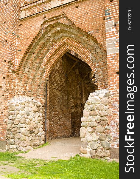 Ruined medieval castle in Latvia on a background of the blue sky