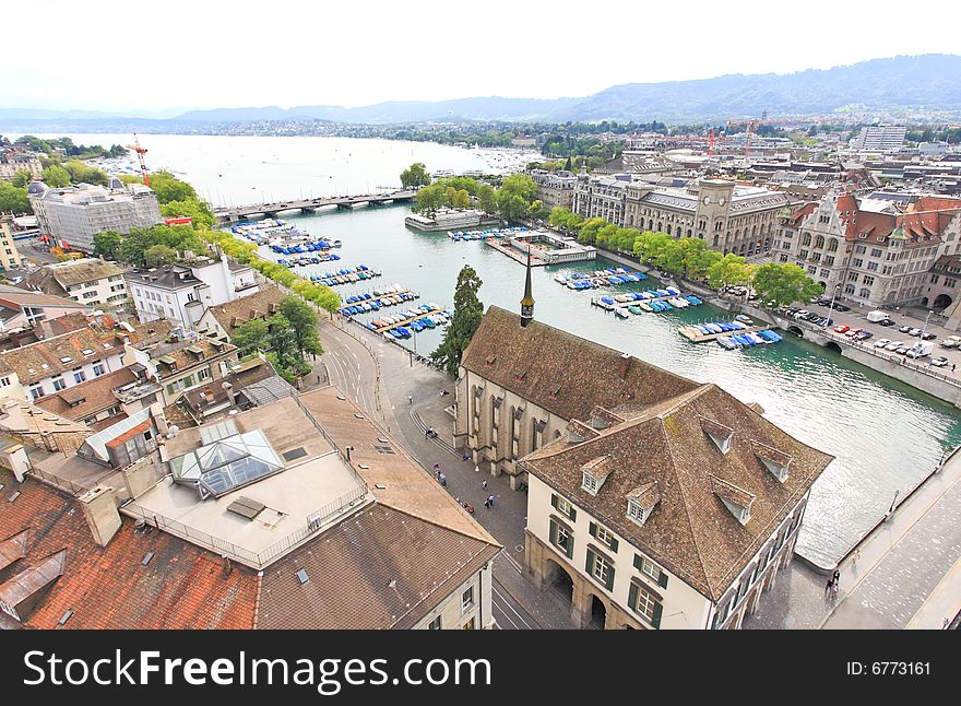 The aerial view of Zurich cityscape from the tower of famous Grossmunster Cathedral