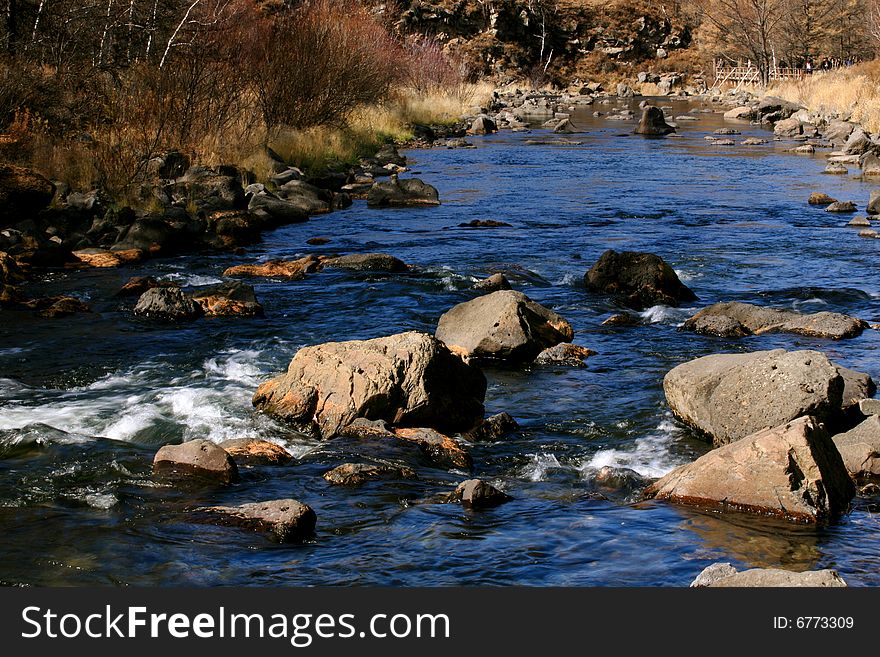 The nonfreezing stream in Arxan national geopark inner mongolia china. The nonfreezing stream in Arxan national geopark inner mongolia china
