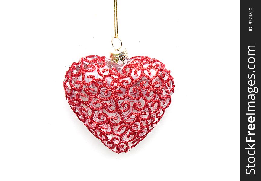 Shot of a pretty heart shaped christmas bauble. Shot of a pretty heart shaped christmas bauble