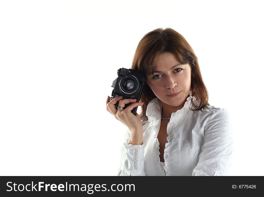 Young woman with old camera isolated on white background