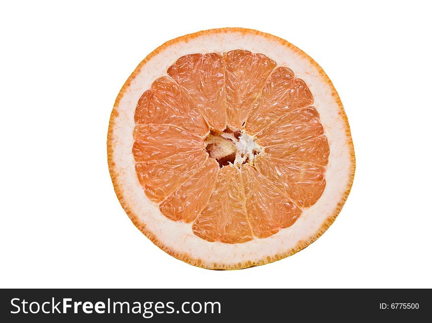 Slice of ruby grapefruit isolated on white